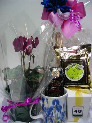 Just For You - This simple, thoughtful basket is a great way to cheer up someone you care about.  Presented in a lovely willow basket, finished with cellophane and a bow.

It contains: 

Devonport Chocs, White Choc Drops 100gm,
Liqueur Coffee 110gm,
Herb and Spice Mill, Pistachio Nuts
Cyclamen plant,
Coffee cup.<br><br>Code:554-1-554-0000062444