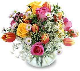 Springtime - Bursting forth with dazzling spring colors, this bouquet of red tulips and pink and yellow roses will make their day.It is a great gift for any festive occasion.<br><br>Code:804-7110-804-0000059606