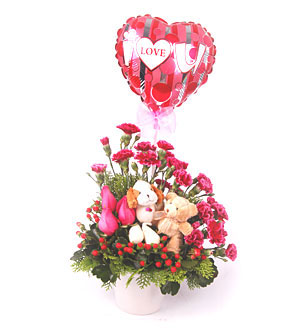 Love You Lots - Tell him or her how much you misses the time together with a happy arrangement of cutesy toys, 