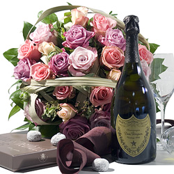 Dom Perignon, Neuhaus Truffels & Flowers - A superb bouquet with large perfumed rosebuds in pink shades, delicious Neuhaus chocolates and an exquisite bottle of Dom P�rignon Champagne. The absolute summum !<br><br>Code:620-7690-620-0000084872