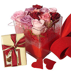 Romance & Chocolates - Charm your Valentine with this delicate and romantic arrangement with pearl, soft pink and burgundy roses in a transparent vase, together with 1/4 lbs of delicious chocolates. A lovely arrangement for someone special !<br><br>Code:643-3724-643-0000105213