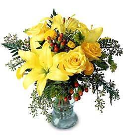 Happy Thoughts - When you want to send your best wishes, this is the bouquet to choose. Sunny yellow lilies are combined with yellow roses, yellow button pompons and assorted greens. A great bouquet to make their day.( Flowers may vary )<br><br>Code:111-3050-111-0000073180