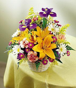 Natural Wonders - This Spring garden display  bright colors of nature. Arrangement includes lilies, iris, daisies and more. . Sale Price!<br><br>Code:111-9849-111-0000073318