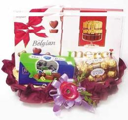 Choco Delight - BELGIAN Chocolate Hearts, 200g - MERCI Finest Selection Chocolate, 200g - ICAM Blus Rose Chocolate Truffles, 195g - FERRERO Rocher, 200g All above includes Packaging and Decoratives<br><br>Code:702-6170-702-0000056106